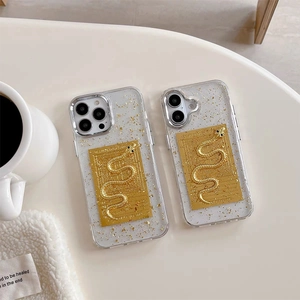 Golden snake pattern iPhone 16 Pro case with gold foil and luxury epoxy resin finish