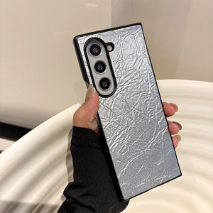 Detail of silver crinkled texture phone case with black frame for Samsung Galaxy S24 Ultra