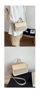 Detail of cream crossbody bag featuring woven texture flap and smooth body construction
