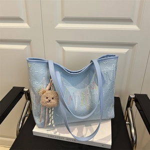 Light blue large capacity canvas tote bag with wave embroidery and plush bear charm