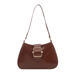 Vintage brown underarm bag with glossy finish and large gold square buckle