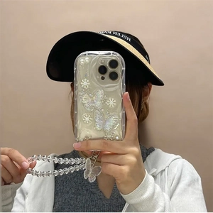 Detail of iPhone case with 3D laser butterflies and acrylic beaded hand strap