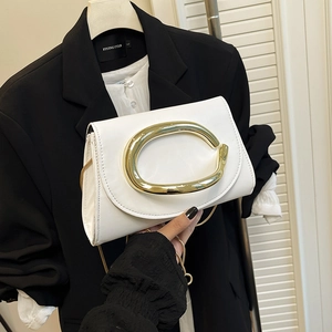 White leather shoulder bag with bold gold C-logo buckle and delicate chain strap