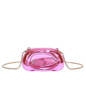 Pink mirrored acrylic evening clutch with gold spiral handle and metal chain strap