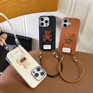 Plush bear iPhone case with leather wrist strap in black brown and cream colors