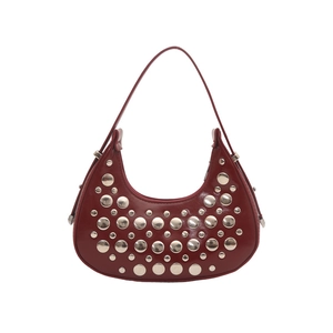 Chic burgundy leather crescent hobo bag featuring polished silver rivet stud embellishments