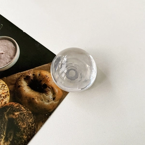 Detail of a round clear silicone protective pad with smooth dome shape and high transparency