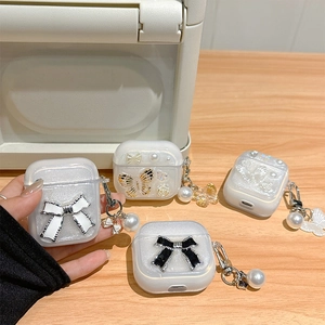 Fundas AirPods transparentes con purpurina, lazos de mariposa y colgantes de perlas