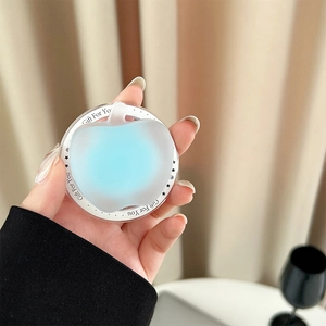 Detail of blue gradient apple-shaped magnetic phone holder with Gift For You text