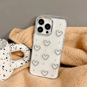 Detail of iPhone case with silver hearts on pearlescent glitter soft TPU material