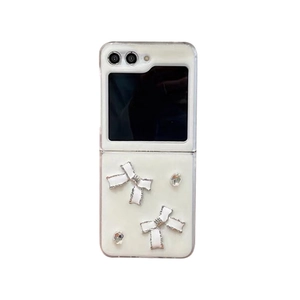 Cremeweiße Handyhülle mit Schleife und Strass für die Samsung Galaxy Z Flip Serie