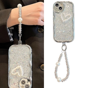 Silver wavy phone case with pearl heart and matching wrist strap for iPhone 17 Pro Max