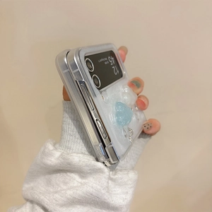 Detail view of Galaxy Z Flip6 case with cute 3D resin clouds and glittery finish