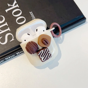 Protective cream silicone case for AirPods Pro featuring 3D chocolate decorations and carabiner