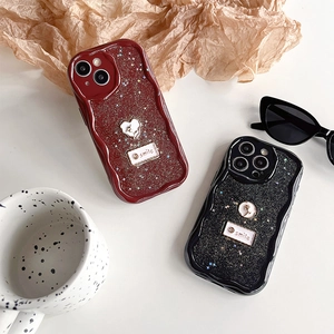 Glitter wavy iPhone case in burgundy and black with heart pattern and smile label