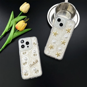 Coque iPhone étoile de mer et nœud perlé avec bordure strass sur fond noir chic