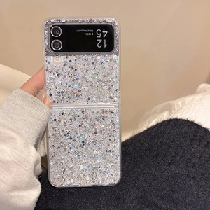Close-up of clear glitter phone case for Samsung Z Flip6 featuring silver sparkling sequins