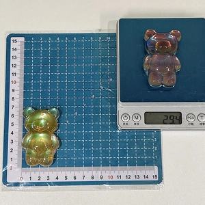 Laser transparent bear phone grip showing dimensions 6.5cm and weight 29.4g