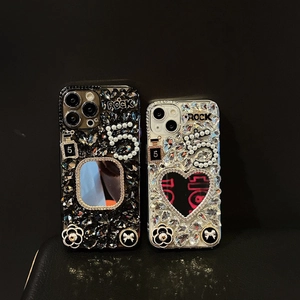 Luxury rhinestone iPhone 16 Pro Max mirror case with floral and pearl accents