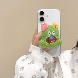 Close-up of cute green plush dog phone grip holder with colorful ears on hand