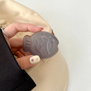 Close-up of translucent grey fish-shaped phone grip with creative minimalist details