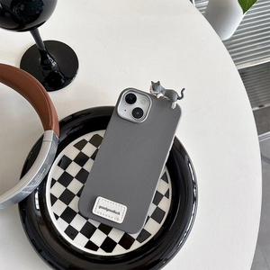 Detailed view of grey faux leather cat phone case with goodgoodluck label for iPhone