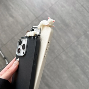 Close-up of cute 3D cat ornament on faux leather iPhone case with precise cutouts