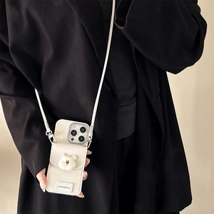 Cream white iPhone case with cute bear design and adjustable crossbody shoulder strap