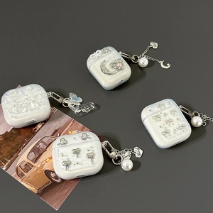Pearlescent AirPods Pro 2 case with 3D heart, star, moon and butterfly metal pendants