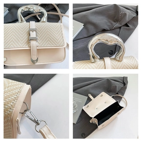Detail of woven texture, silver irregular handle, and interior of the beige crossbody bag
