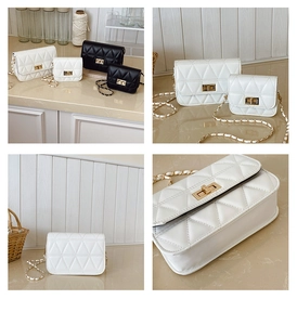 Detail view of quilted chain bags in black and white leather with metal turn-lock closures
