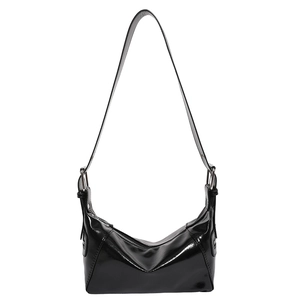 Glossy black underarm bag with sleek silhouette and silver metallic hardware