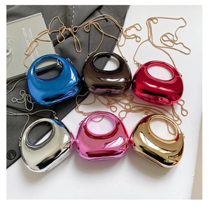Polished metallic moon-shaped evening bags in six colors with chain straps