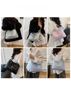Detailed views of quilted chain bucket bags in multiple colors with star ornaments