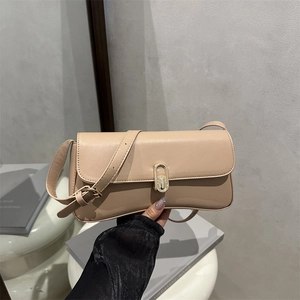 Chic beige baguette bag with gold twist lock and adjustable strap for women
