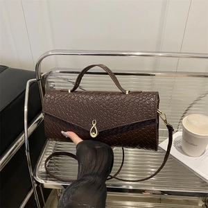 Deep brown crocodile pattern shoulder bag with golden metal buckle for women