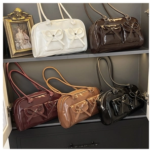 Collection of retro glossy PU tote bags in five colors with bow detail and long handles