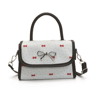 Polka dot bow handbag for women with silver metal buckle and black shoulder strap