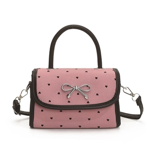 Red and white striped mini handbag with black heart print and silver bow detail