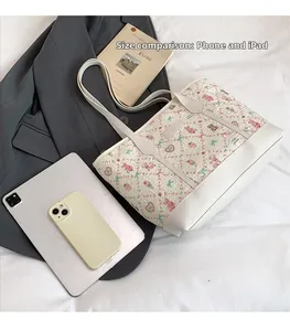 Cute cartoon tote bag size comparison showing spacious interior next to iPad and phone