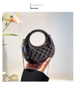 Mini gunmetal acrylic quilted crescent box bag, ideal for parties and crossbody wear.