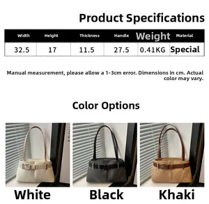 Detailed view of tote bag in white black and khaki with decorative buckle straps