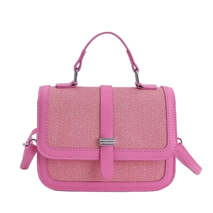 Elegant pink woven crossbody bag with leather trim and top handle for women