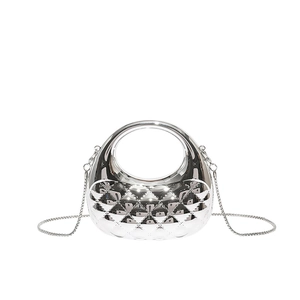 Glossy silver metallic acrylic handbag with quilted diamond pattern and chain strap