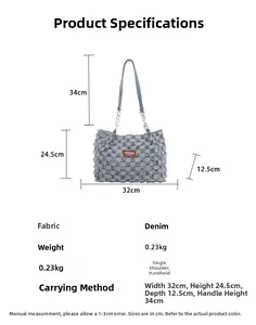 Detail view of checkered denim tote bag showing dimensions 32x24.5x12.5cm and chain strap