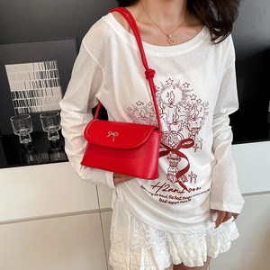 Red PU leather square shoulder bag with metal bow and knotted strap design