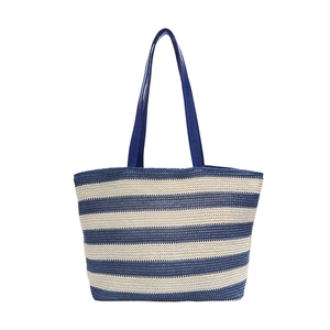 Large blue and beige striped woven tote bag with leather handles in a front-view studio shot