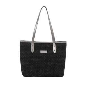 Sac fourre-tout noir à pois blancs pour femmes avec détails métalliques argentés