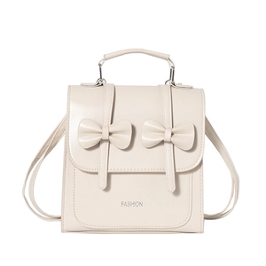 Cream white PU leather bow mini backpack with silver fashion text in a minimalist design