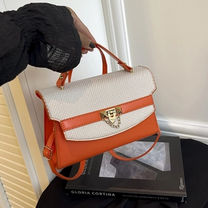 Borsa Kelly bicolore arancione e beige con chiusura dorata e tracolla regolabile